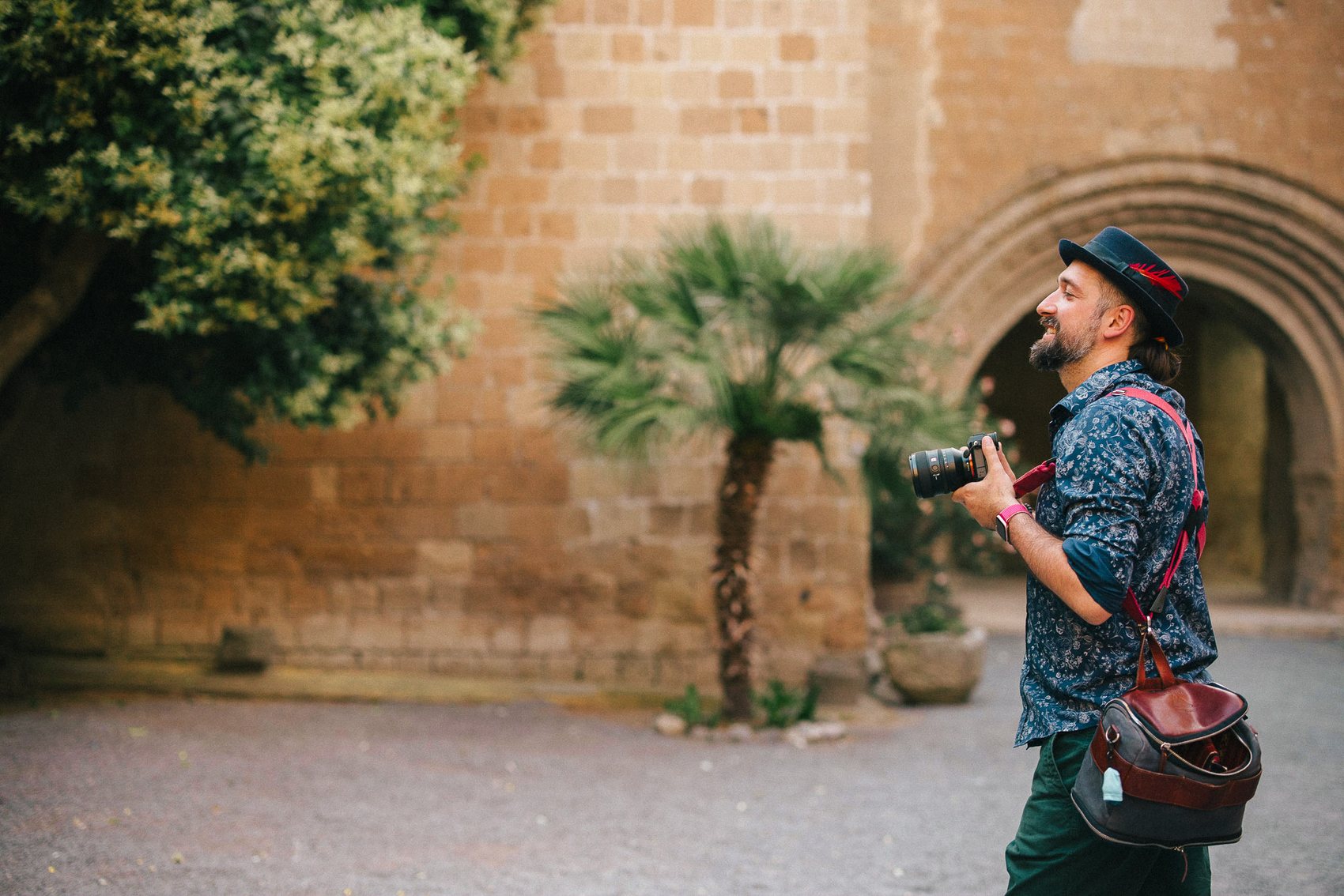 Magic holding a camera at an Italian wedding venue