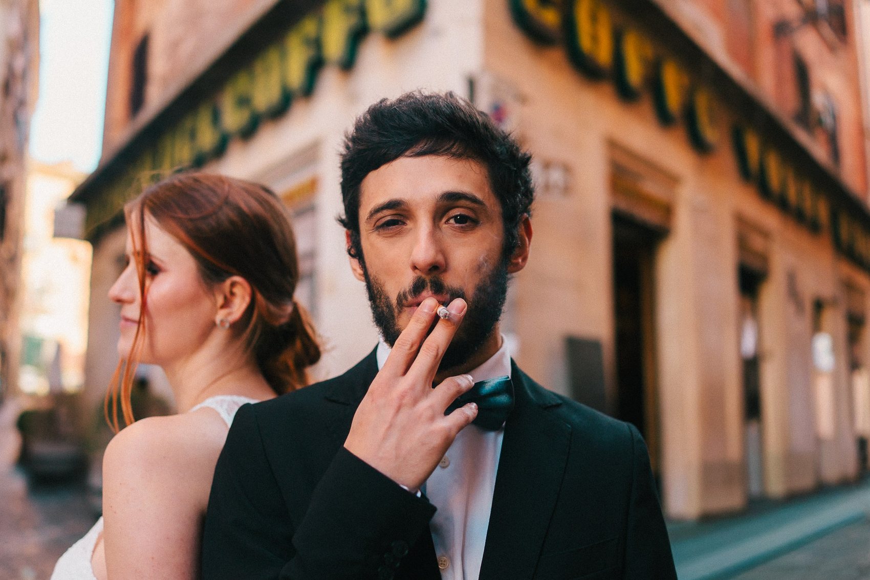Couple portrait in a warm Italian city square