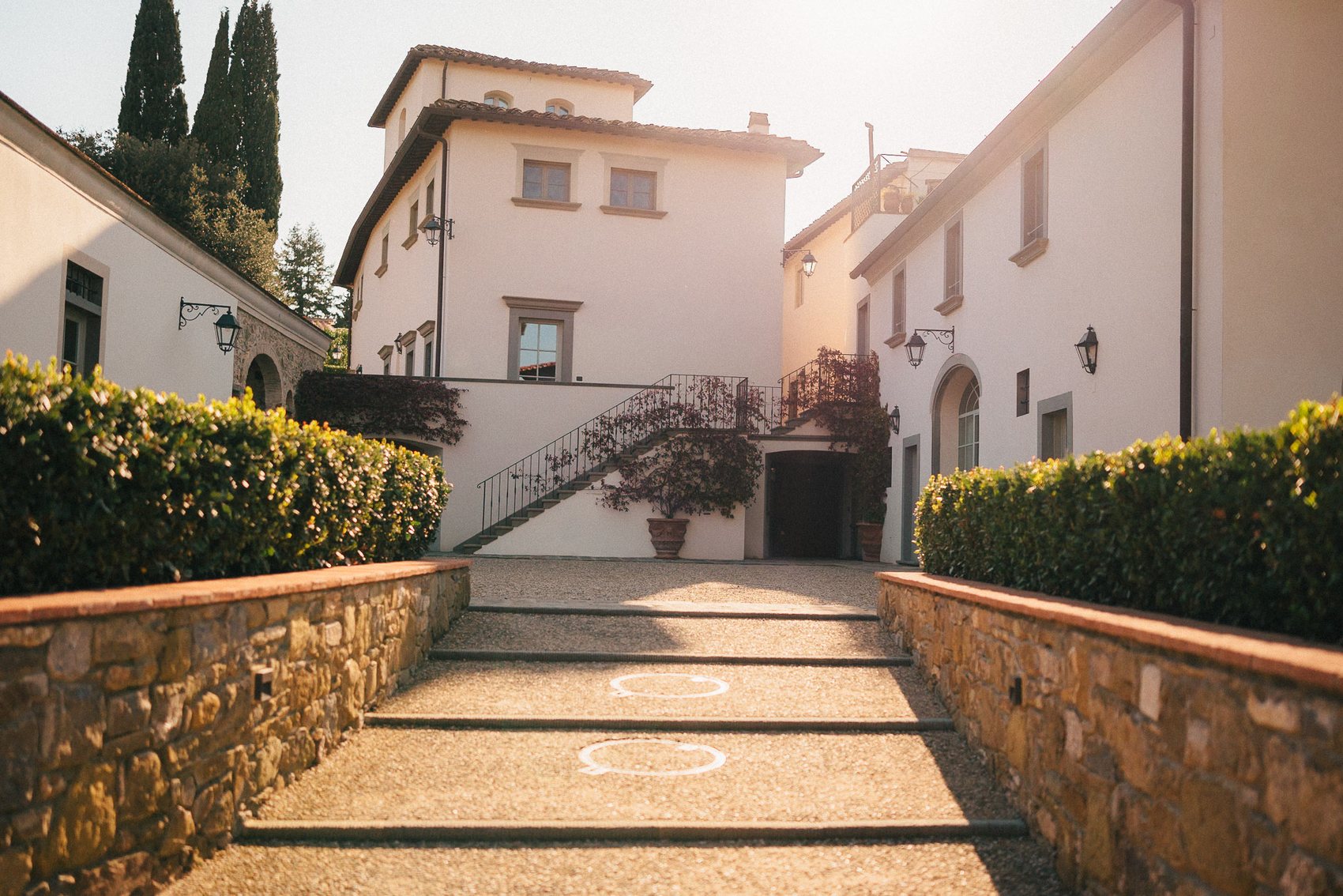 Italian wedding venue lane in warm evening light